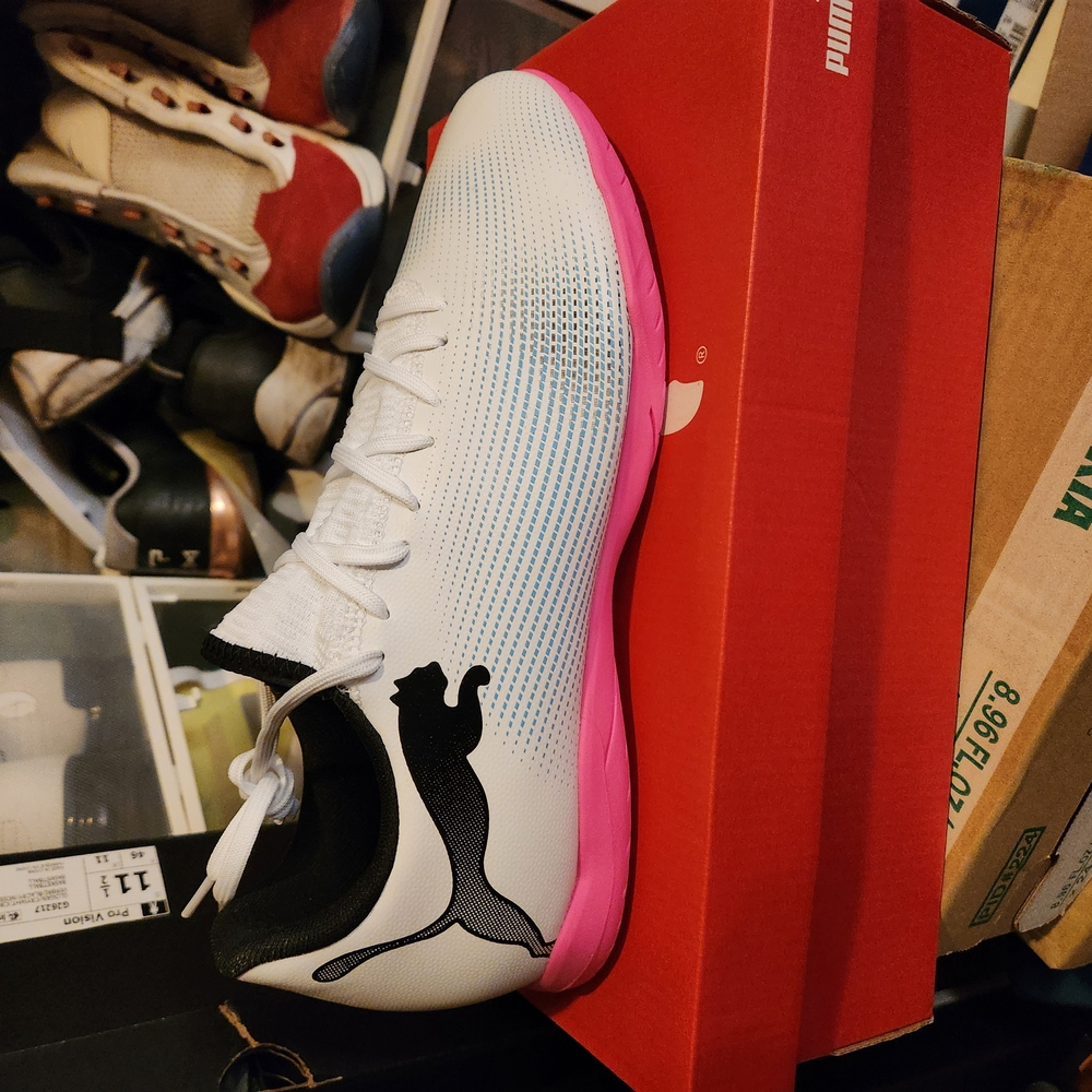 Puma White and Pink Athletic Shoes with Sleek Design